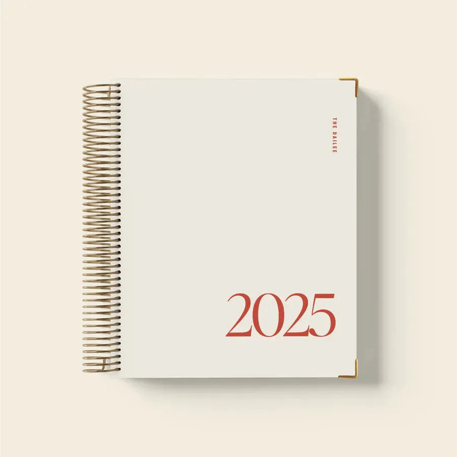 Cherry red A4 daily schedule coil notebook with hardback cover showing coil binding