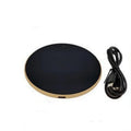 Black USB heating coaster for warming cups of coffee or tea on a desk