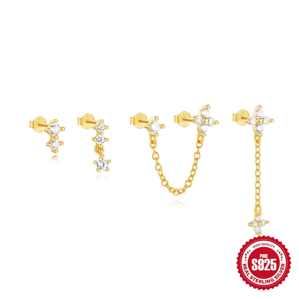 Geometric clover petal earrings in sterling silver with electroplated gold finish.