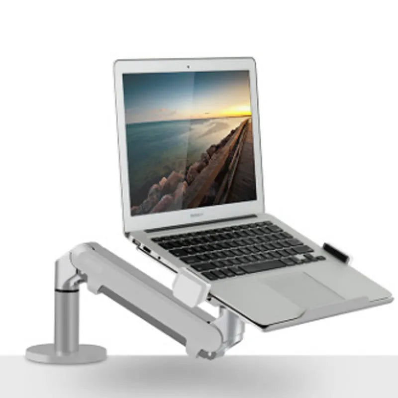 Silver aluminium alloy computer stand with hover bracket design supporting a laptop