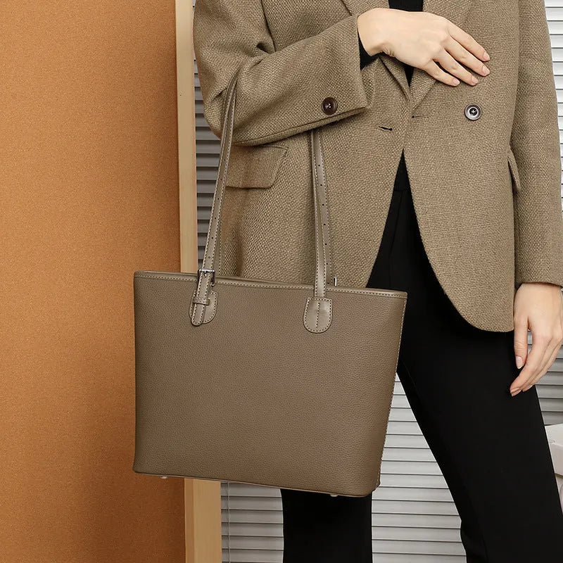 Genuine leather women's tote bag in retro style with multiple internal compartments