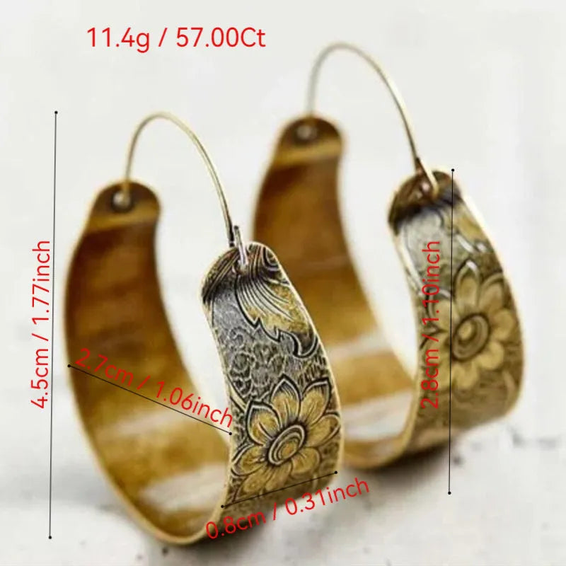 Gold-coloured geometric women's earrings with hollow pattern design and petal-inspired elements