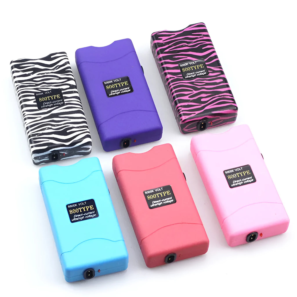 Purple multi-function female self-defence flashlight with strobe and alarm features.