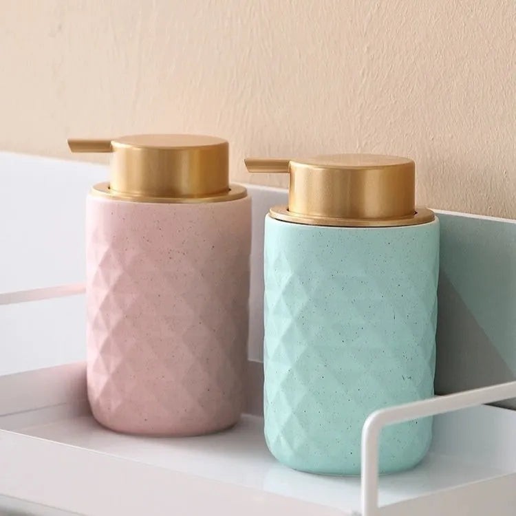 Large pump head facial cleanser foam bottle in metallic gold, silver, or matte black colour options