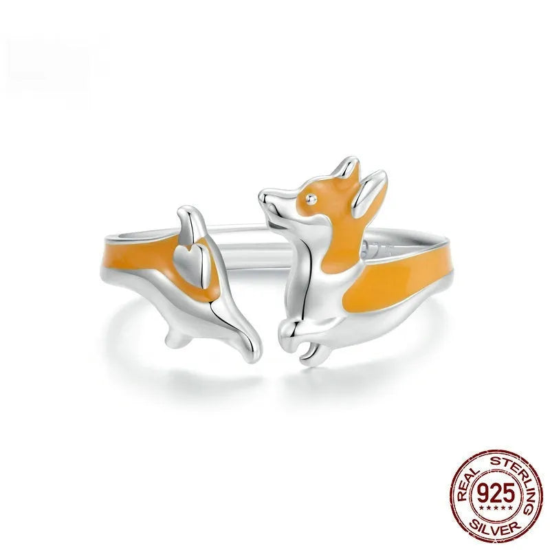 Sterling silver adjustable ring with a detailed cartoon Corgi design and electroplated finish.