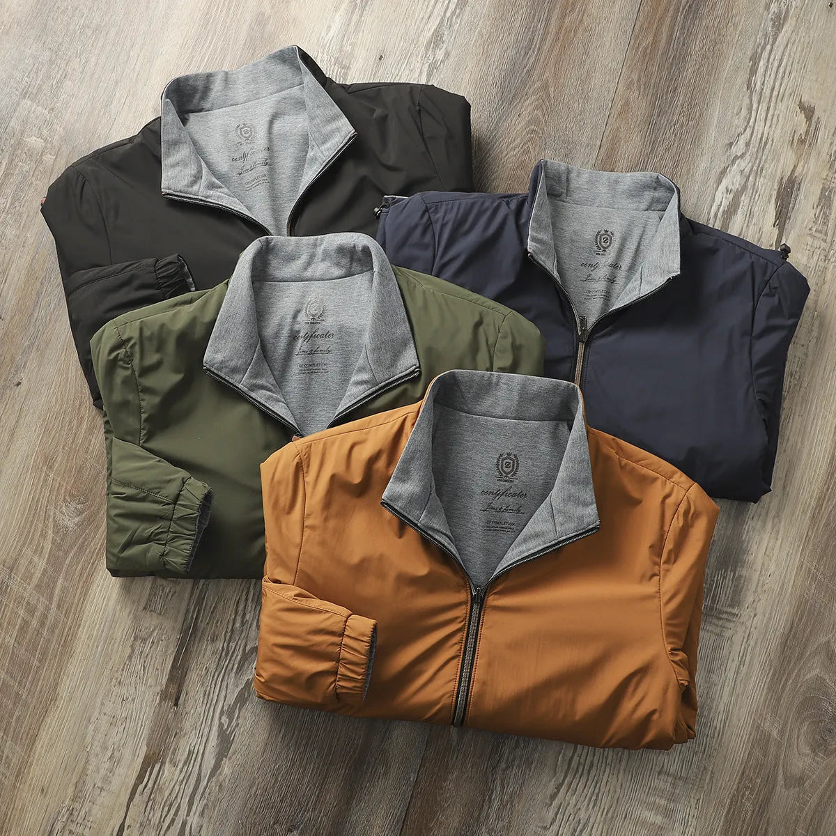 Men's simple stand collar jacket in army green colour, showing regular fit and sleeve design.