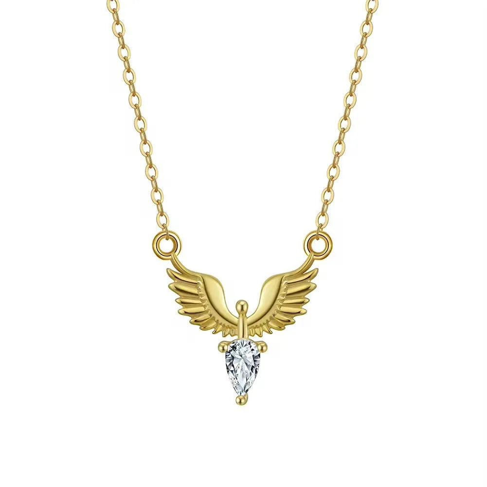 Close-up of a sterling silver eagle pendant necklace on an O-ring chain, showing white gold and yellow gold colour options.