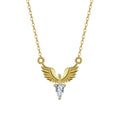 Close-up of a sterling silver eagle pendant necklace on an O-ring chain, showing white gold and yellow gold colour options.