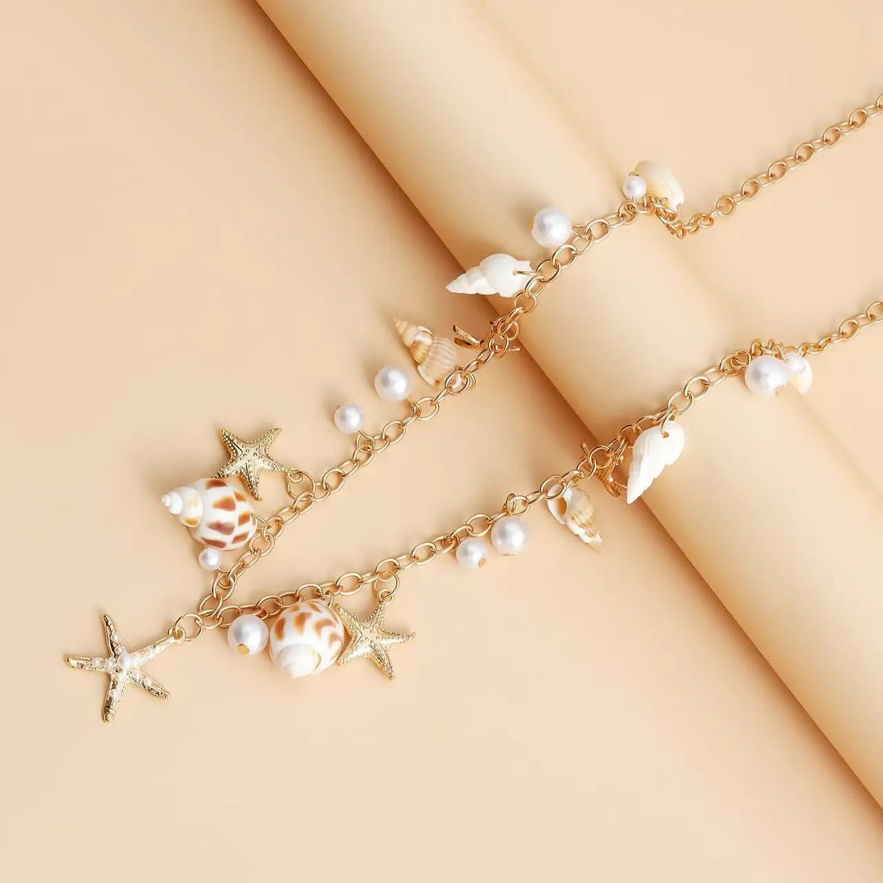 Women's alloy waist chain and matching bracelet with star charms for beach fashion