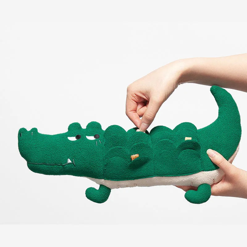 Green plush toy dog measuring 35cm tall by 18cm wide on white background