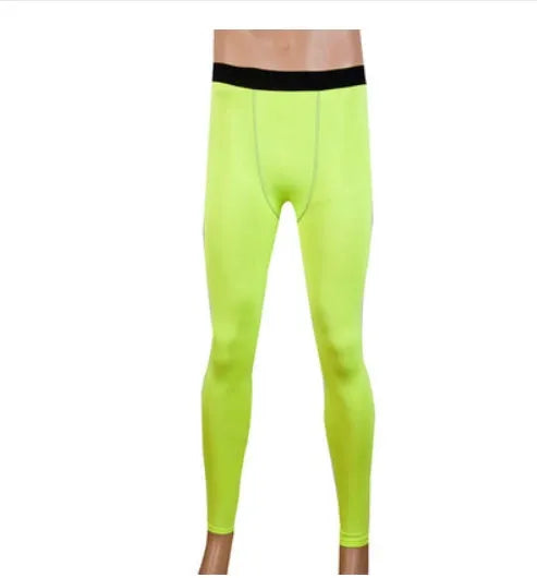 Kids sportswear set including black and green t-shirts, shorts, and trousers on a size chart.