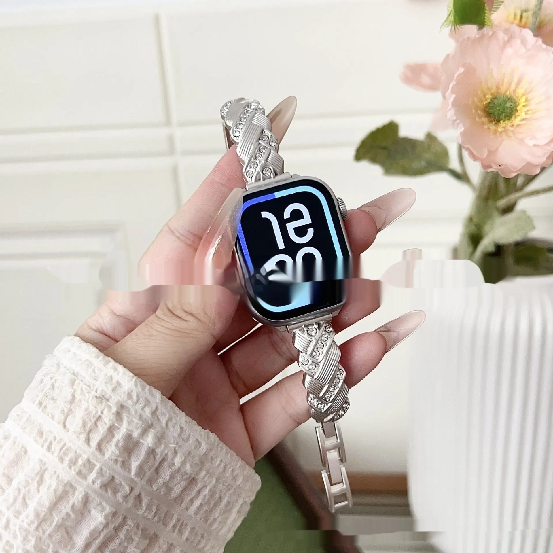 Zinc alloy metal watch strap for iPhone in silver, rose gold, gold, black, and starlight colour options on a grey background.