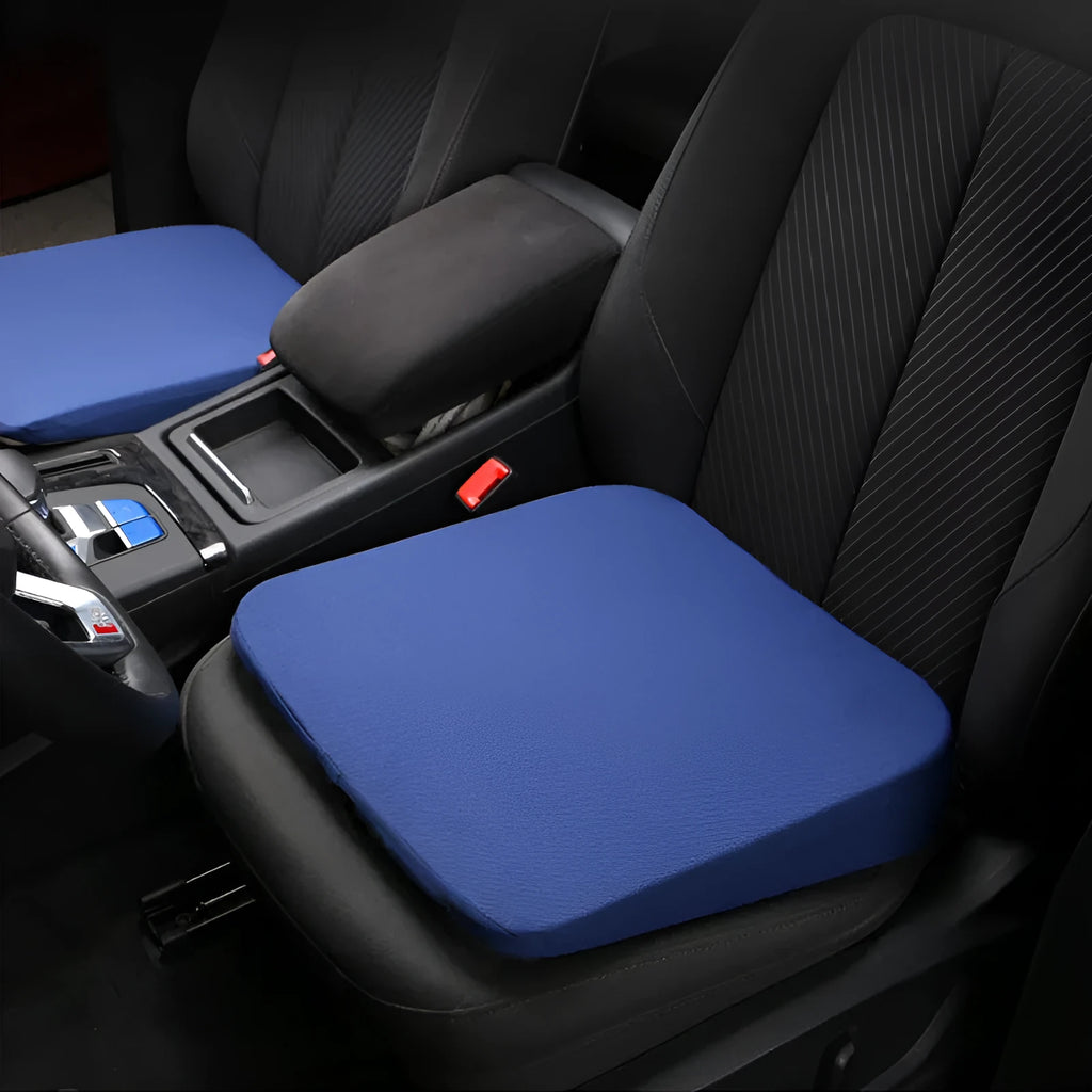 Black car seat cushion with dimensions 42x39x6cm on vehicle seat