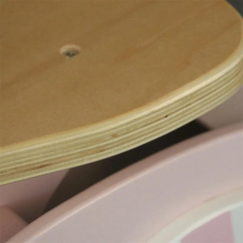 Pink wooden balance scooter for toddlers, 10 inches long, for children aged 1-6 years.