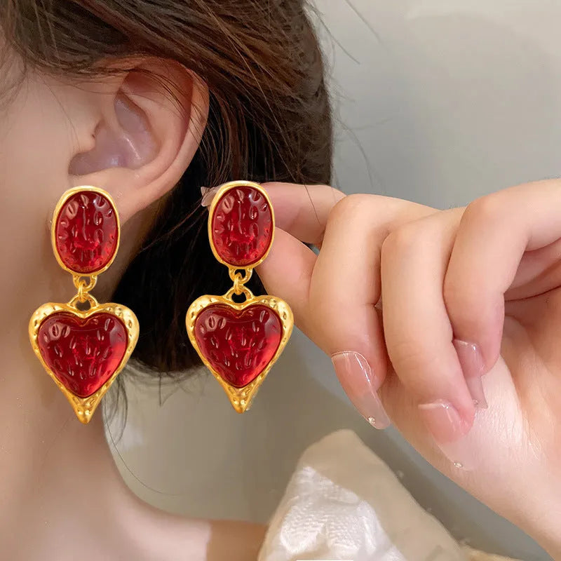 Oval love heart stud earrings with pleated texture in purple, red, green, and yellow white colours.