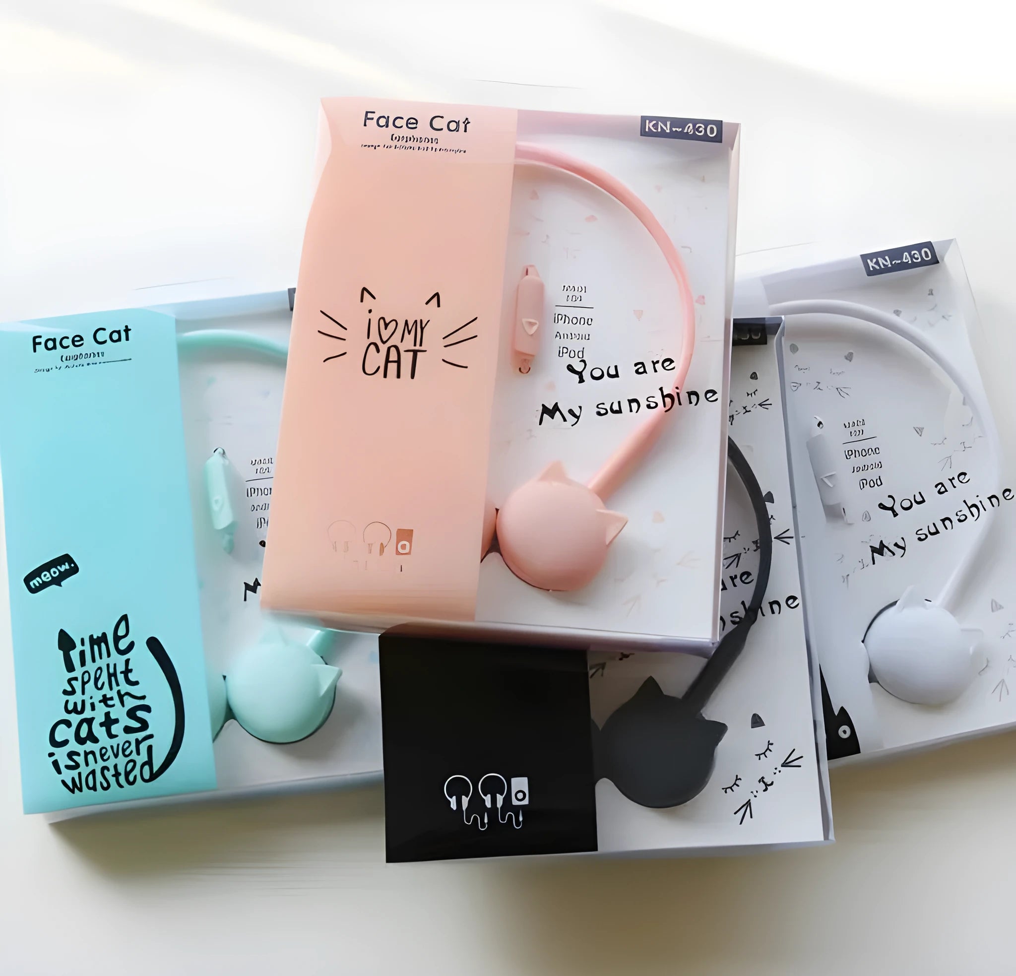Wireless cat ear stereo earphones in pink, blue, black, and white colours with a charging case