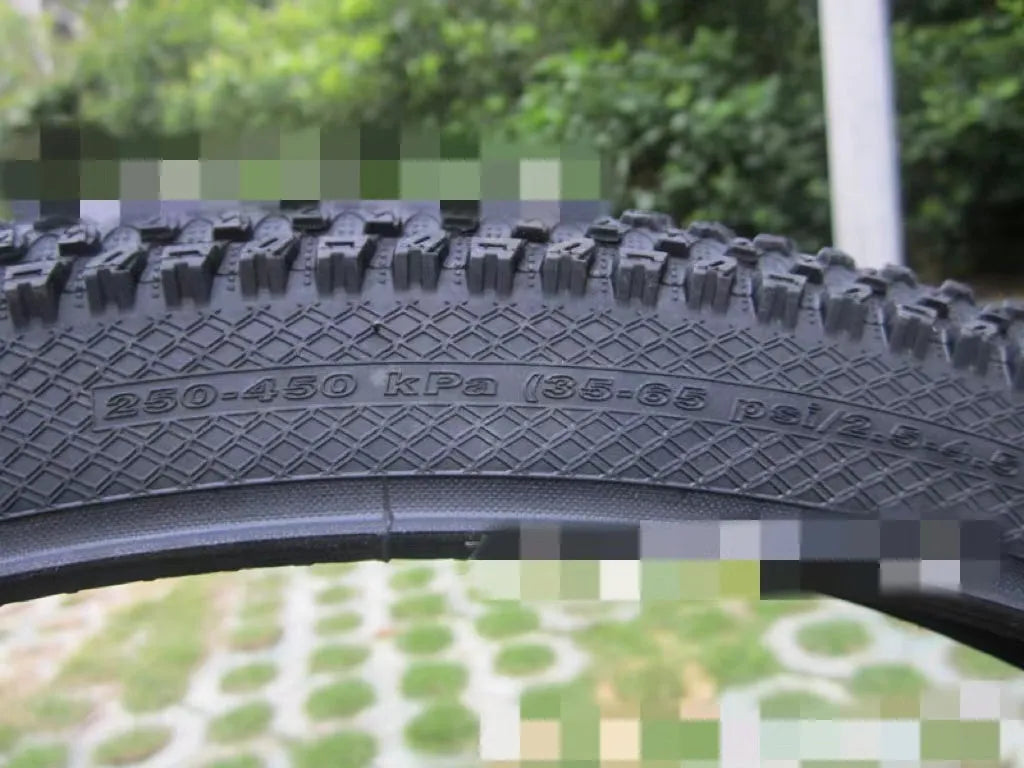 Mountain bike ultralight puncture-resistant tyre showing tread pattern and sidewall with size options