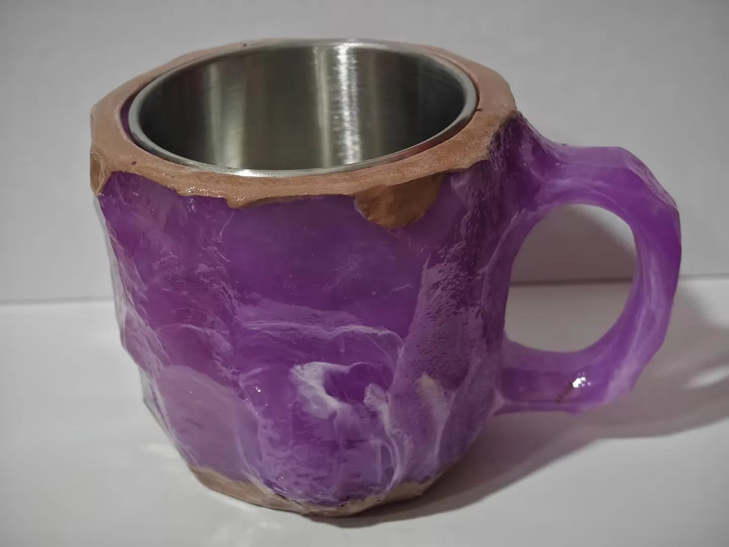 Purple resin mineral crystal coffee mug with handle showing 3D texture and 10cm height