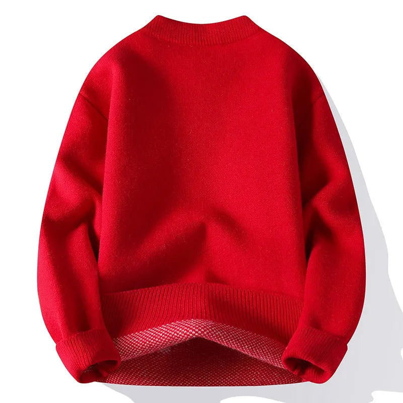 Men's loose fit grey knitted pullover jumper with long sleeves and a ribbed hemline.