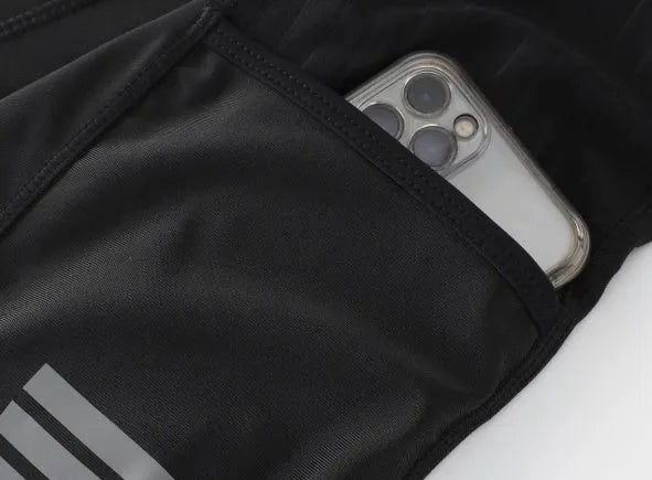 Black cycling shorts with integrated chamois padding and two side pockets for road or mountain biking.