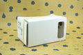 Cardboard VR glasses folded flat with 3D lens, rubber band, Velcro and magnet for 6-inch smartphones