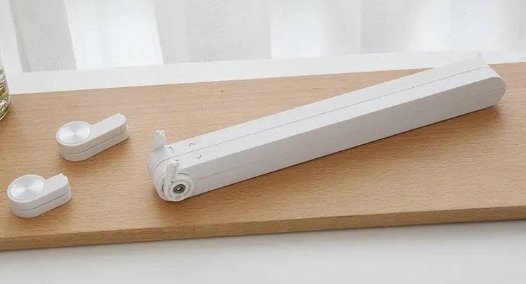 White Whale Race laptop bracket with desktop elevation and integrated heat sink base on desk