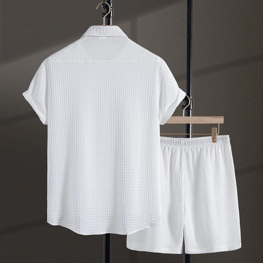 Men's casual short sleeve shirt and matching shorts set in black, laid flat.