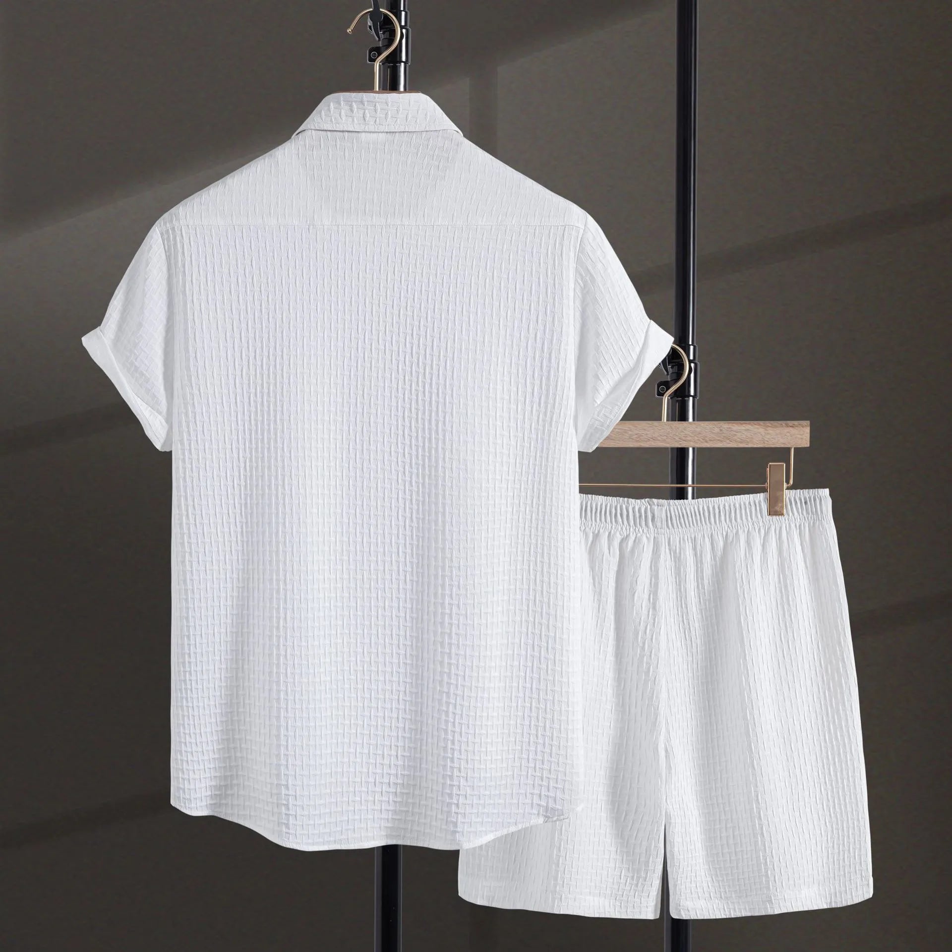 Men's casual short sleeve shirt and matching shorts set in black, laid flat.