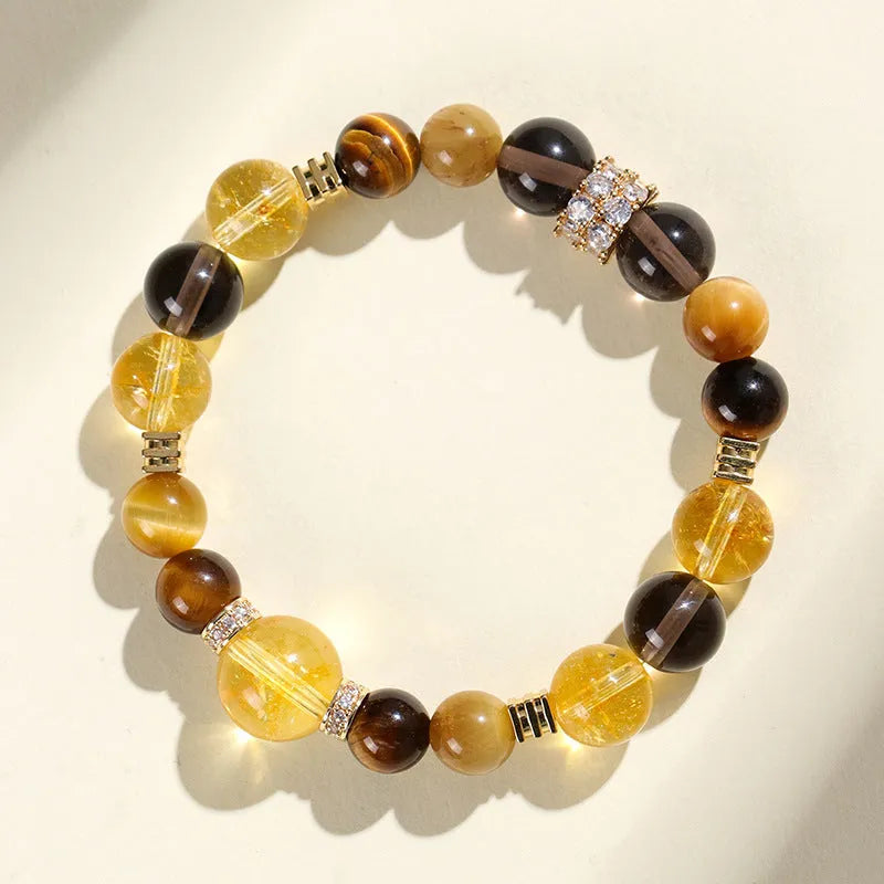 Women's natural yellow tower 10mm artificial crystal string bead bracelet on a white background.