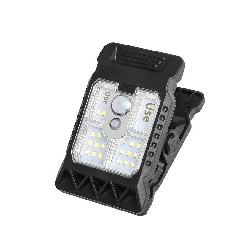 Compact intelligent induction clip lamp with motion sensor and clip base.