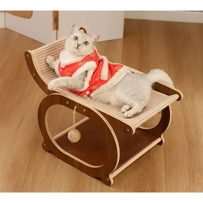 Solid wood cat scratching bed with sisal mat in walnut colour.