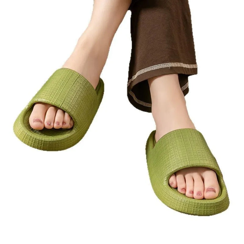 Pair of adult unisex EVA toe-ring slippers in a chosen colour, showing the non-slip sole and flip-flop design.