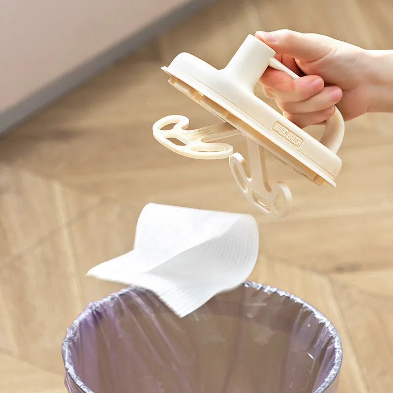 Magic Brush disposable cleaning brush with handle, 50 white rag refills, and a storage box holder.