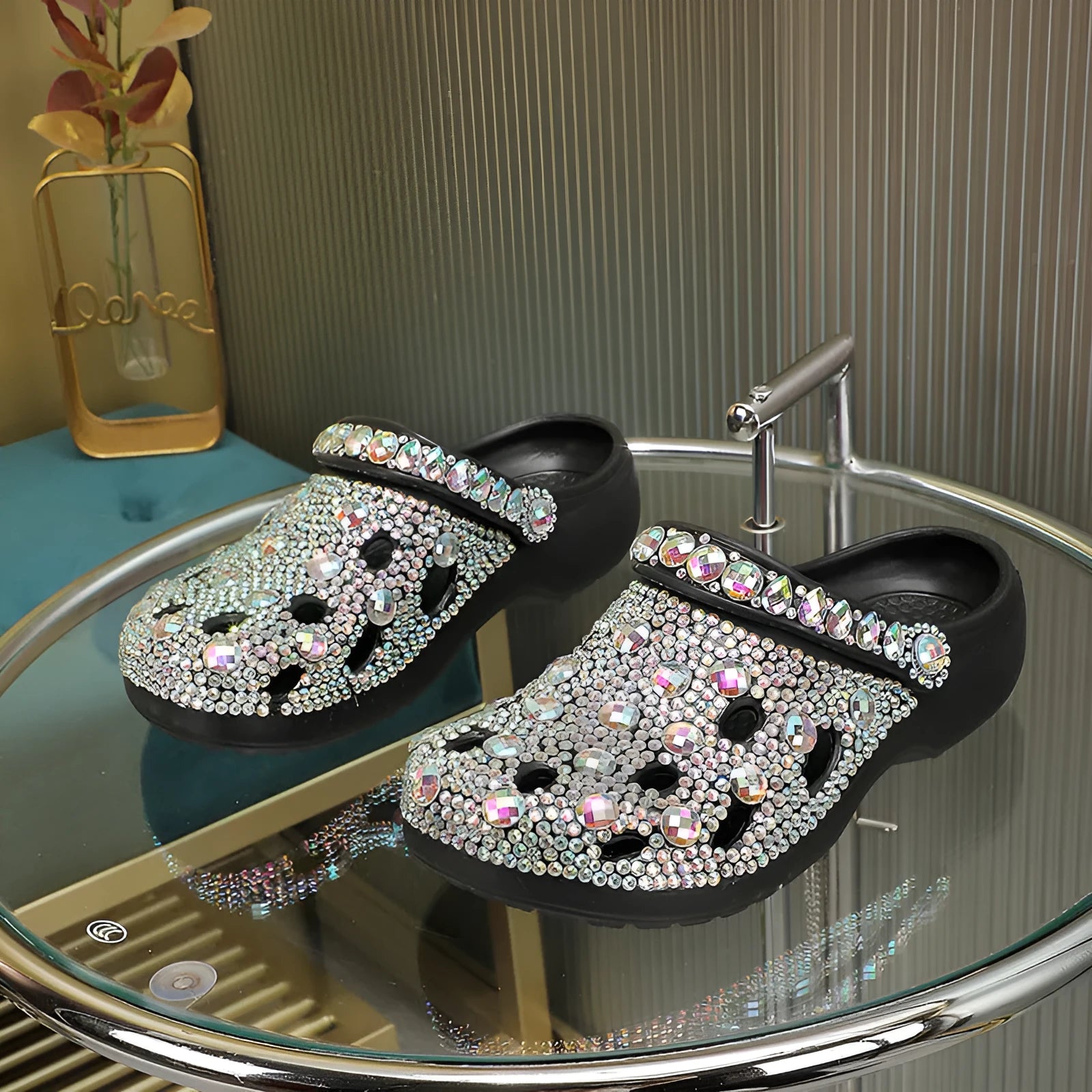 Black women's platform sandals with rhinestone decoration and a perforated slider design.