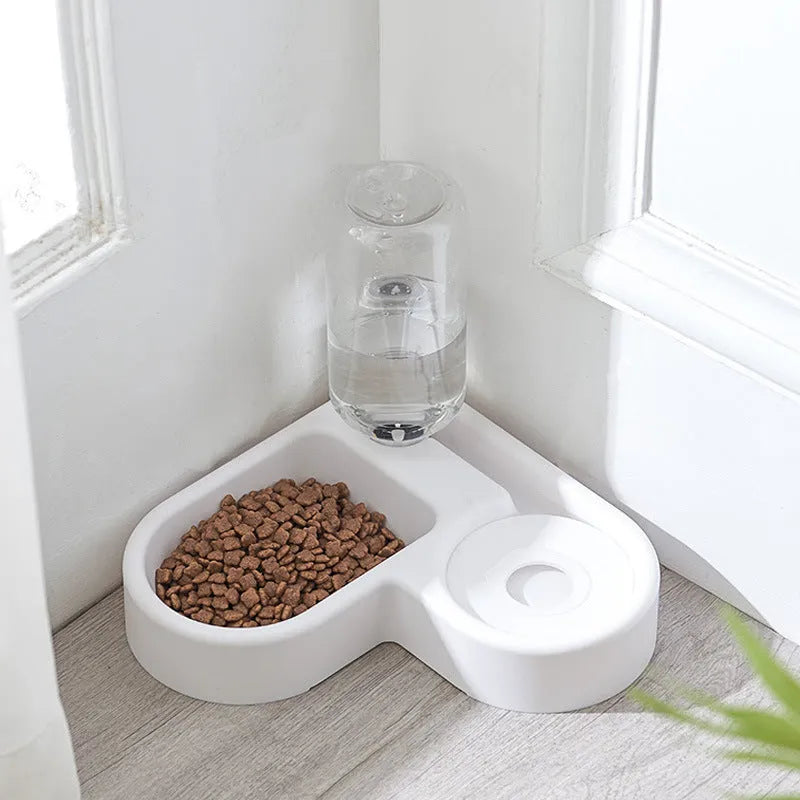 White pet water fountain for cats and dogs with stainless steel drinking top.