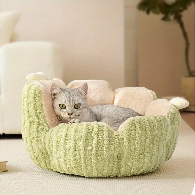 Green cactus-patterned cat litter mat with non-slip backing placed under a litter box