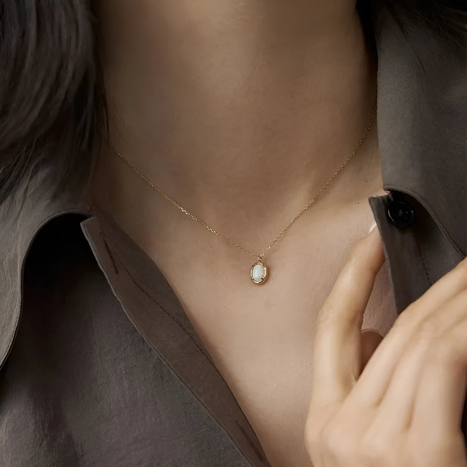 Simple geometric oval jelly opal pendant necklace on S925 silver chain in gold or white gold finish.