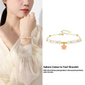 S925 silver cherry blossom pendant on Hetian jade beaded bracelet for women