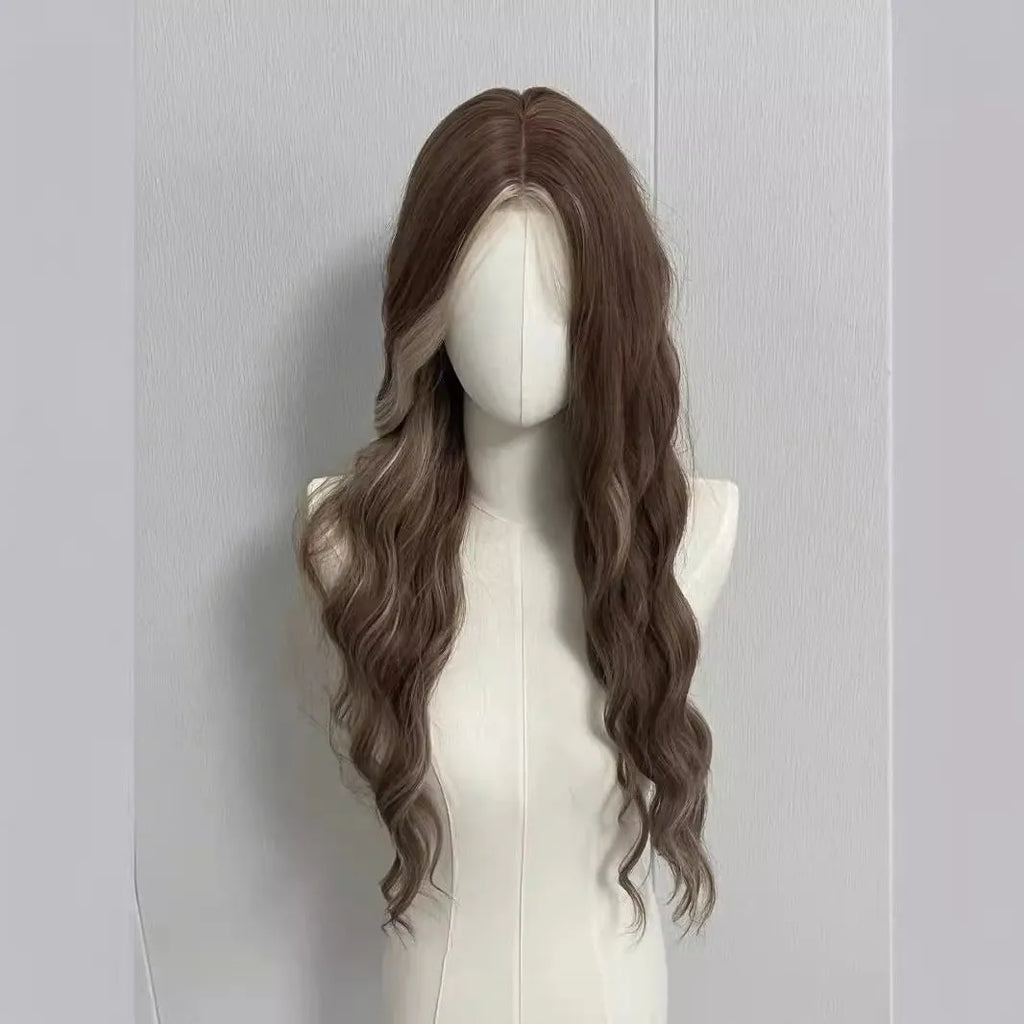 Long curly synthetic wig in gray gold with highlights, shown on a model.