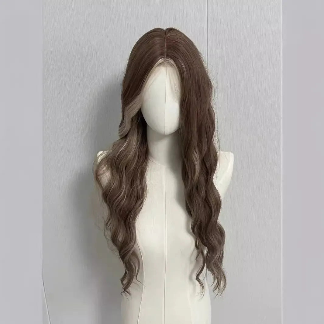 Long curly synthetic wig in gray gold with highlights, shown on a model.