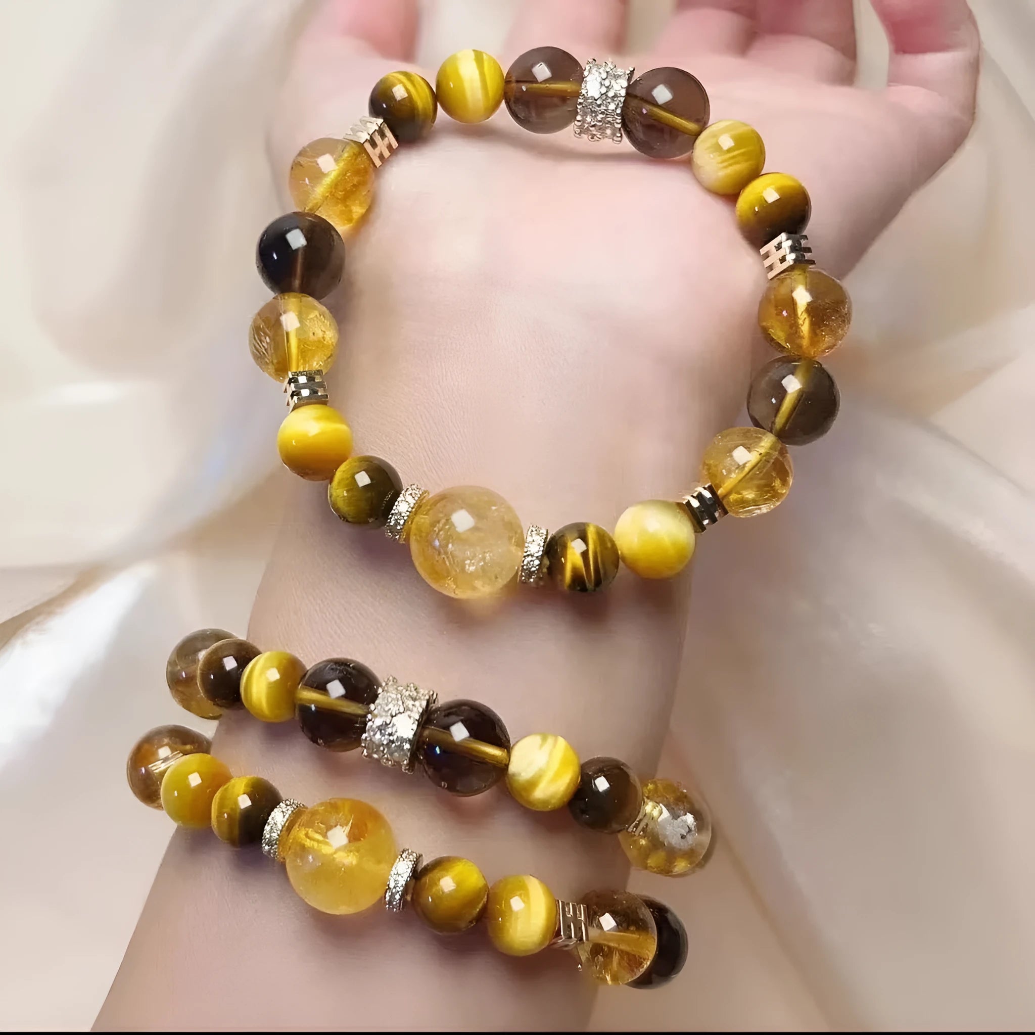 Women's natural yellow tower 10mm artificial crystal string bead bracelet on a white background.