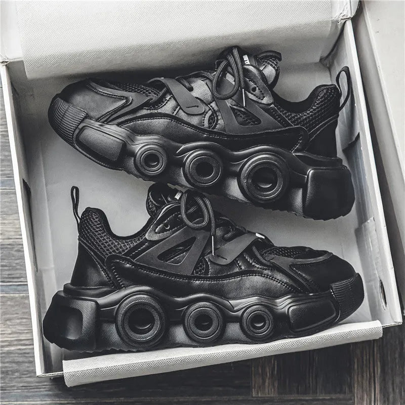 Men's low-top casual sneakers with mesh upper and thick rubber sole in black, grey, or white.