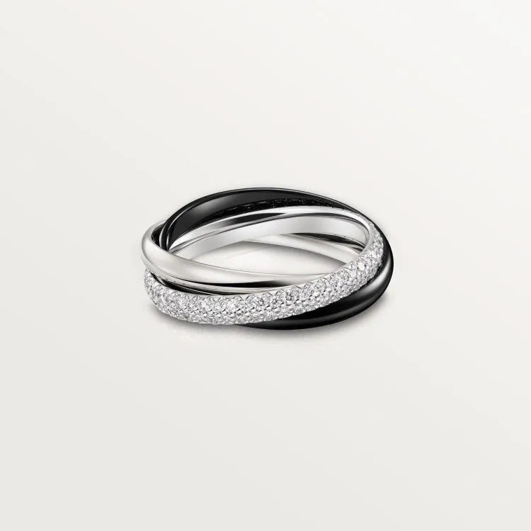 Sterling silver couple ring with full diamond setting and U-shaped geometric design on a finger.