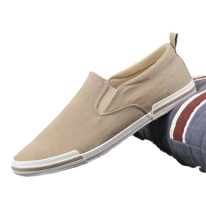 Men's canvas casual shoes in grey colour with vulcanised rubber sole and cotton lining
