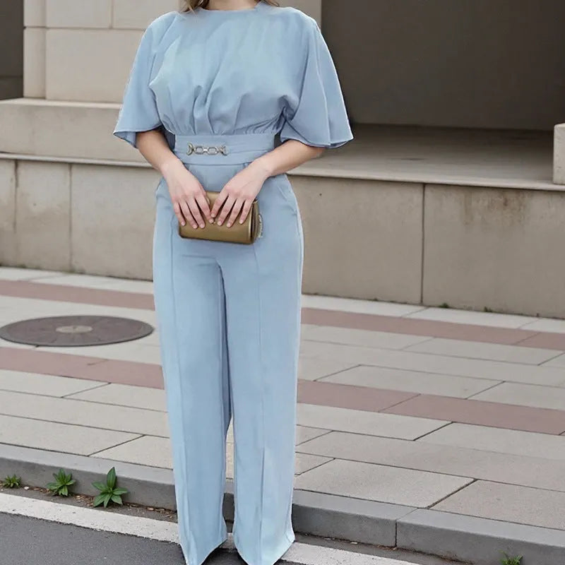 Blue men's polyester suit set with trousers and a long-sleeve top on a mannequin.