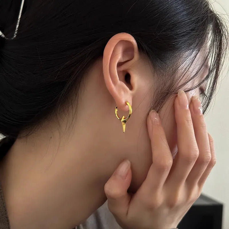 Geometric star-shaped ear clips for women with copper construction and white gold electroplated finish