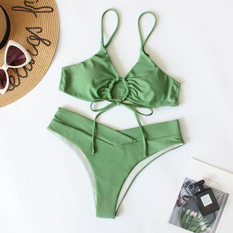 Women's pure colour bikini swimsuit with a tied bow detail, shown in one of eight available colours.
