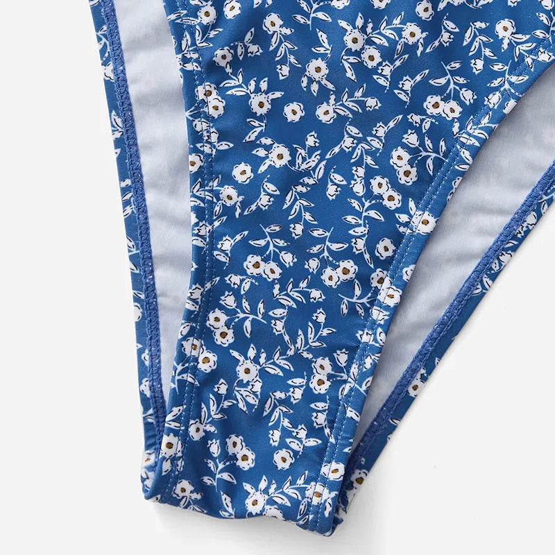 Blue polyester swimsuit set with separate top and shorts for swimming, no steel rings