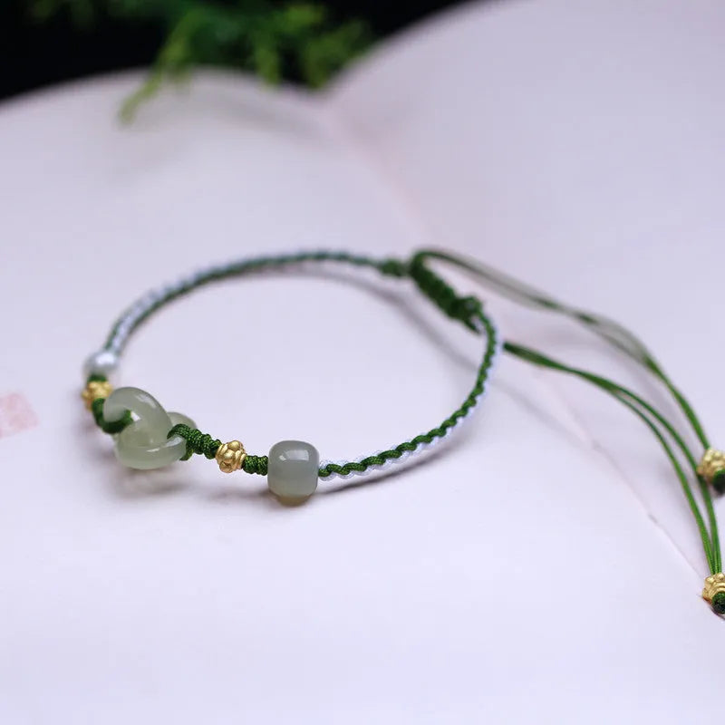 Natural Hetian Jade woven bracelet with adjustable flexible wire and jade pendant in traditional Chinese design