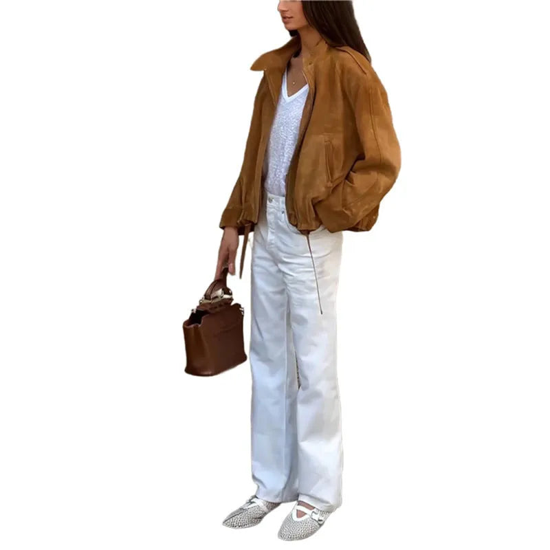 Man wearing a solid colour loose-fit retro style polyester jacket